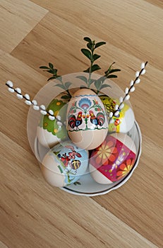 Easter eggs with boxwood and catkins