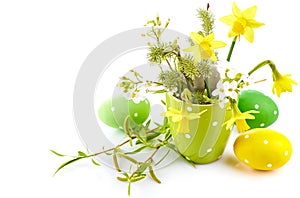 Easter eggs with bunch spring flowers narcissus