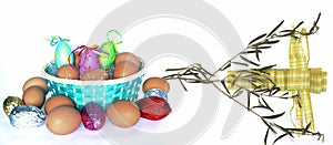 Easter eggs, cloth cross, and olive branch isolated on white