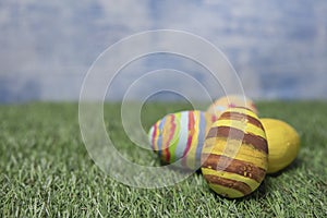 Easter eggs colored on grass  wide view or side view