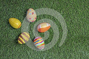Easter eggs colored on grass  wide view or top view