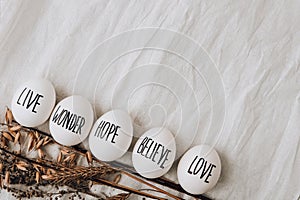 Easter eggs Composition. Egg name settings and happy easter message, drawn with pen. High Angle View Of Shells On Table. Love Live