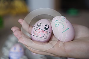 Easter eggs with Corona virus protection concepts. DIY easter eggs wearing mask for Easter holidays decoration. Selective