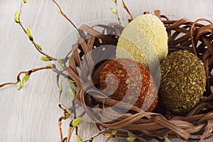 Easter eggs covered in spices and couscous