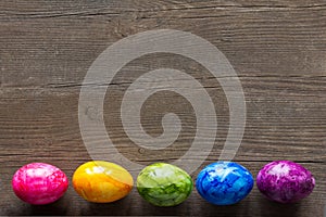 Easter Eggs dark wood copyspace