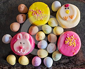 Easter eggs and decorated cake on a plate