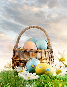 Easter eggs decorated with flowers in the grass