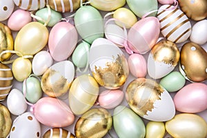 Easter eggs decoration Pastel colored golden egg photo