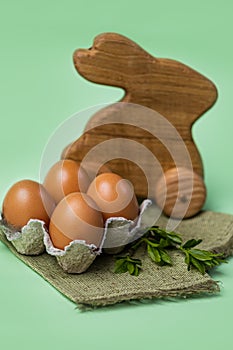 Easter eggs and an Easter Bunny on a green background-an