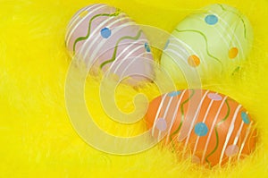 Easter eggs on feather nest