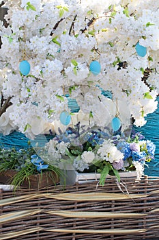 Easter eggs on a flowering tree.