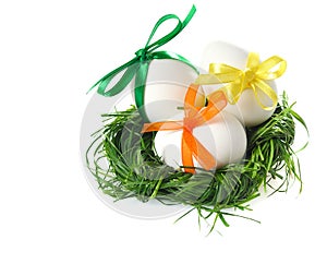 Easter eggs in grass basket