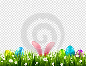 Easter eggs on grass with bunny rabbit ears set. Spring holidays in April. Sunday seasonal celebration with egg hunt.