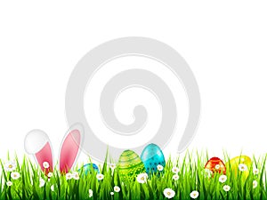 Easter eggs on grass with bunny rabbit ears set. Spring holidays in April. Sunday seasonal celebration with egg hunt.