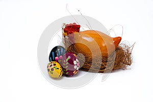 Easter eggs and hen on nest