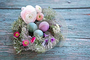 Easter eggs in a herb nest