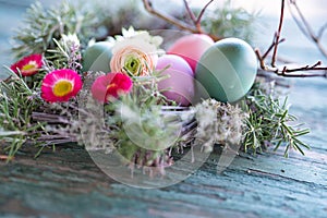 Easter eggs in a herb nest