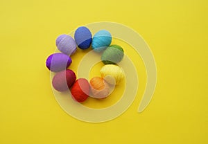 Easter eggs knitted from wool. Manual work. Rainbow. Easter.