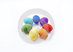 Easter eggs knitted from wool. Manual work. Rainbow. Easter