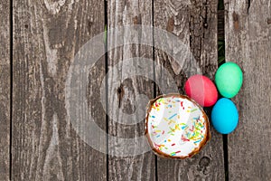 Easter eggs lie on a wooden board and easter eggs for easter