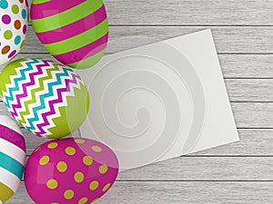 Easter eggs lying on wooden desk with chit