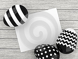 Easter eggs lying on wooden desk with paper chit