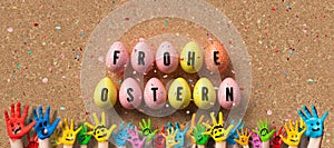 Easter eggs with message HAPPY EASTER in German