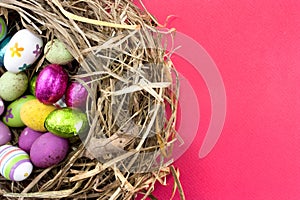 Easter eggs in nest on red