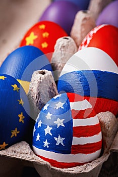 Easter eggs painted in the colors of flags of different states