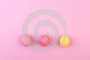 Easter eggs on pink background. Copyspace. Flat lay