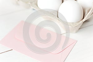 Easter eggs and pink envelope