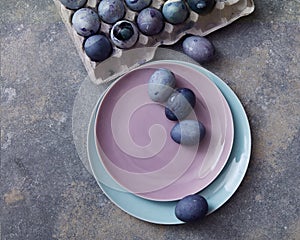 Easter eggs with plates and tray