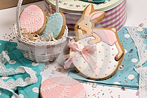 Easter eggs and rabbit honey-cake, sweet color background kitchen