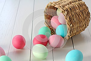Easter Eggs Rolling Out of a Basket
