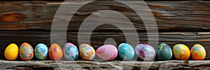 Easter eggs on rustic wooden background with many wooden slats