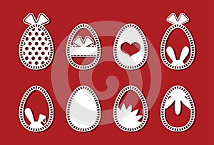 Easter eggs set. White abstract ornamental flower eggs for laser cutting on red background. Icons for greeting card