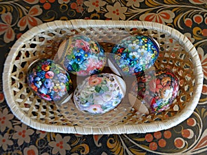Easter eggs in straw basket
