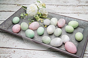 Easter eggs on vintage metal tray