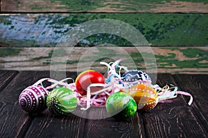Easter eggs on wood desk.