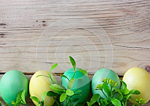 Easter eggs on wooden background