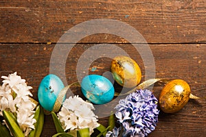 Easter eggs on wooden background