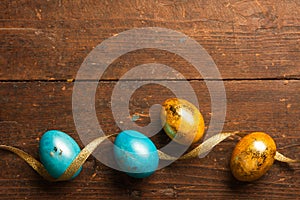 Easter eggs on wooden background