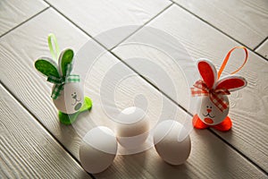 Easter eggs on wooden background. Happy Easter. Creative photo with easter eggsEaster eggs on wooden background. Happy Easter.