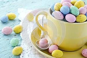 Easter eggs in a yellow cup