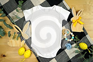 Easter farmhouse theme baby apparel top view flatlay. Mock up.