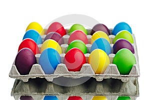 Easter festive multicolor eggs carton, white background