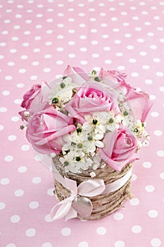 Easter flower decoration with pink roses and ornithogalum arabicum