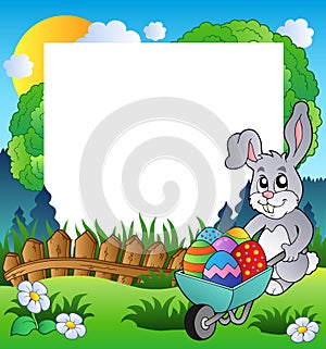 Easter frame with bunny and barrow photo