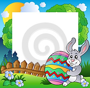 Easter frame with bunny holding egg