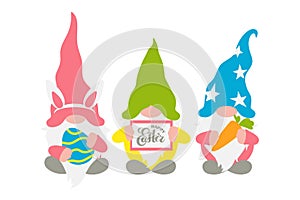 Easter gnomes, three Scandinavian gnomes in pastel colors with a chocolate easter egg, rabbit ears, carrot, and frame